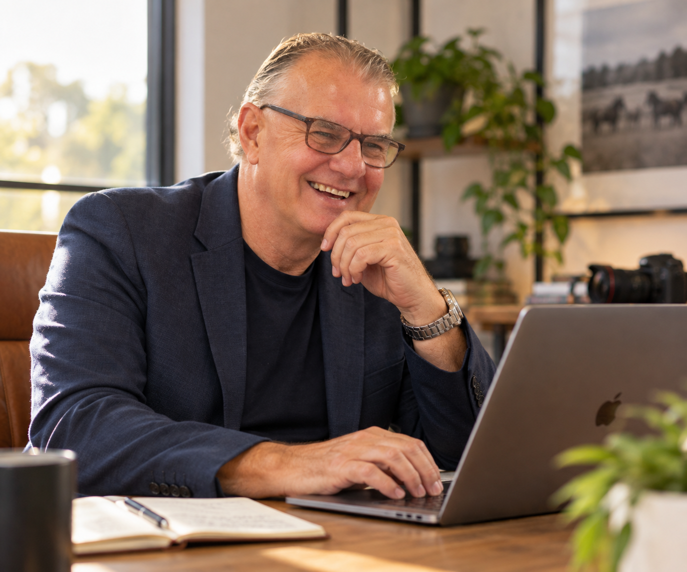 Steven Zilm working at a laptop